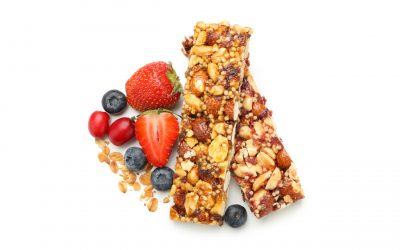 Tasty granola bars isolated on white background